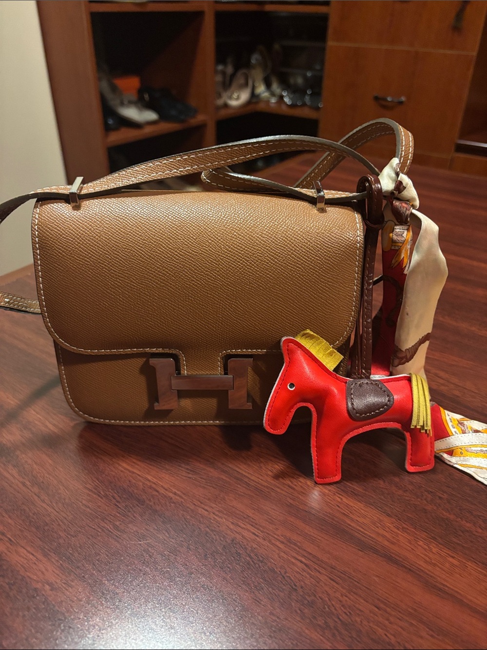 Classic Tan Leather Crossbody Bag with Horse Charm